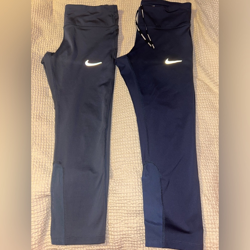 Woman’s size medium Nike Dri-Fit cropped running leggings.